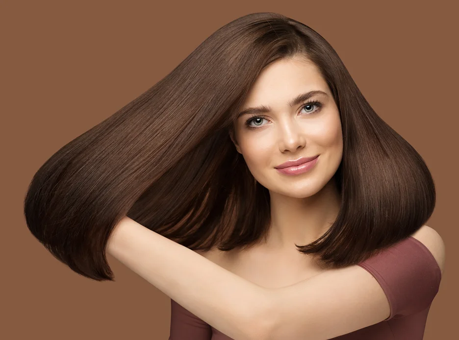 a woman with thick, bouncy hair