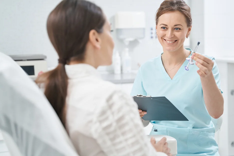 provider showing pdrn exosome to the patient while discussing about the treatment